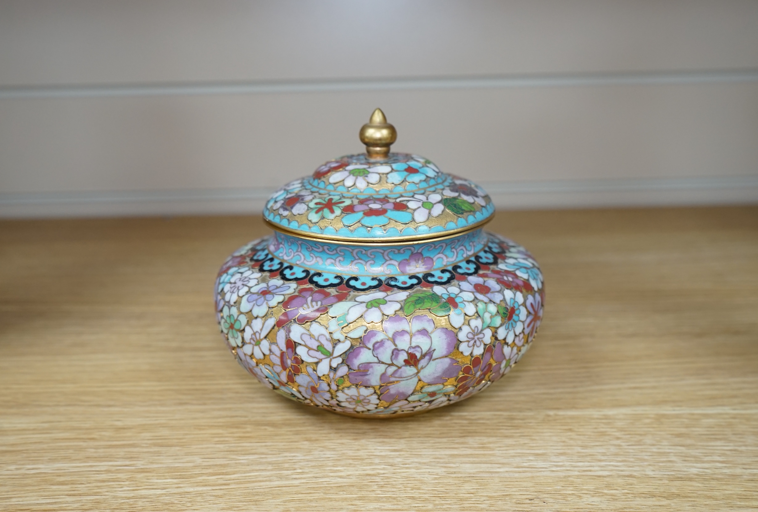 A 20th century Chinese cloisonné enamel pot and cover, 14cm. Condition - good
